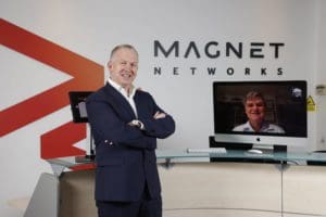 Picture of Peter McCarthy, CEO of Speed Fibre Group, with Ken Peterson, Columbia Ventures Corporation, founder of Magnet Networks